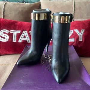 Fergie never worn Elegant Black Leather Ankle Boots with Gold Accents